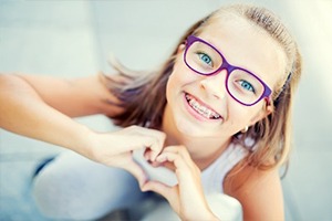 young girl with braces