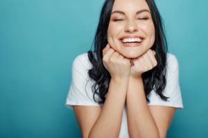 Smiling woman with same-day dental crown from Burleson dentist