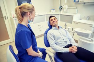 man smiling at his dentist in Burleson
