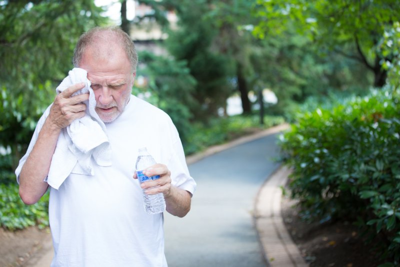 Man suffering signs of dehydration