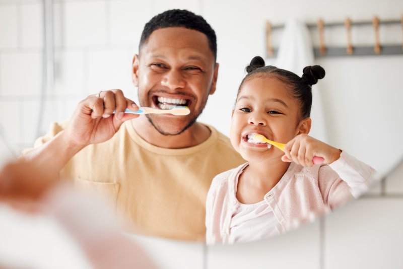 Family practicing good dental hygiene